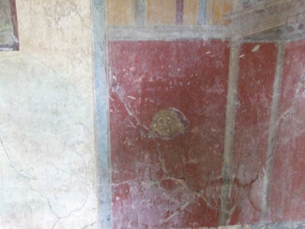 IX.13.1-3 Pompeii. March 2009. Room 17, painting of mask.