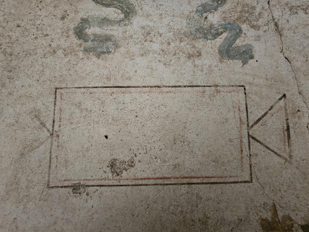 IX.13.1-3 Pompeii. November 2024. Room 21, detail from lararium. Photo courtesy of Annette Haug.