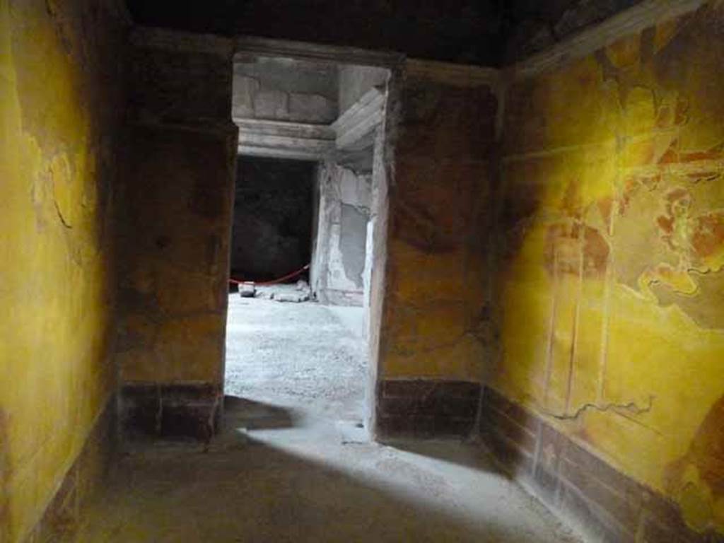 IX.13.1-3 Pompeii. May 2010. Room 26, looking east through window in west wall.