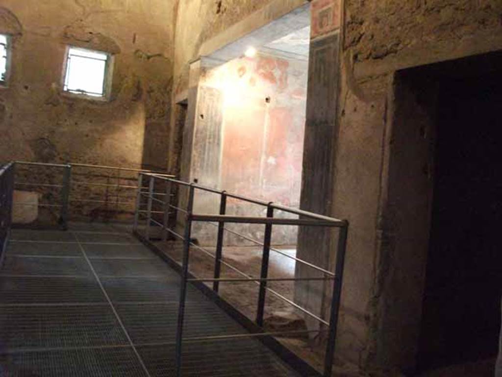 IX.13.1-3 Pompeii. May 2010. Room 31, looking west , north side with doorways to rooms 24, 25 and 25a.