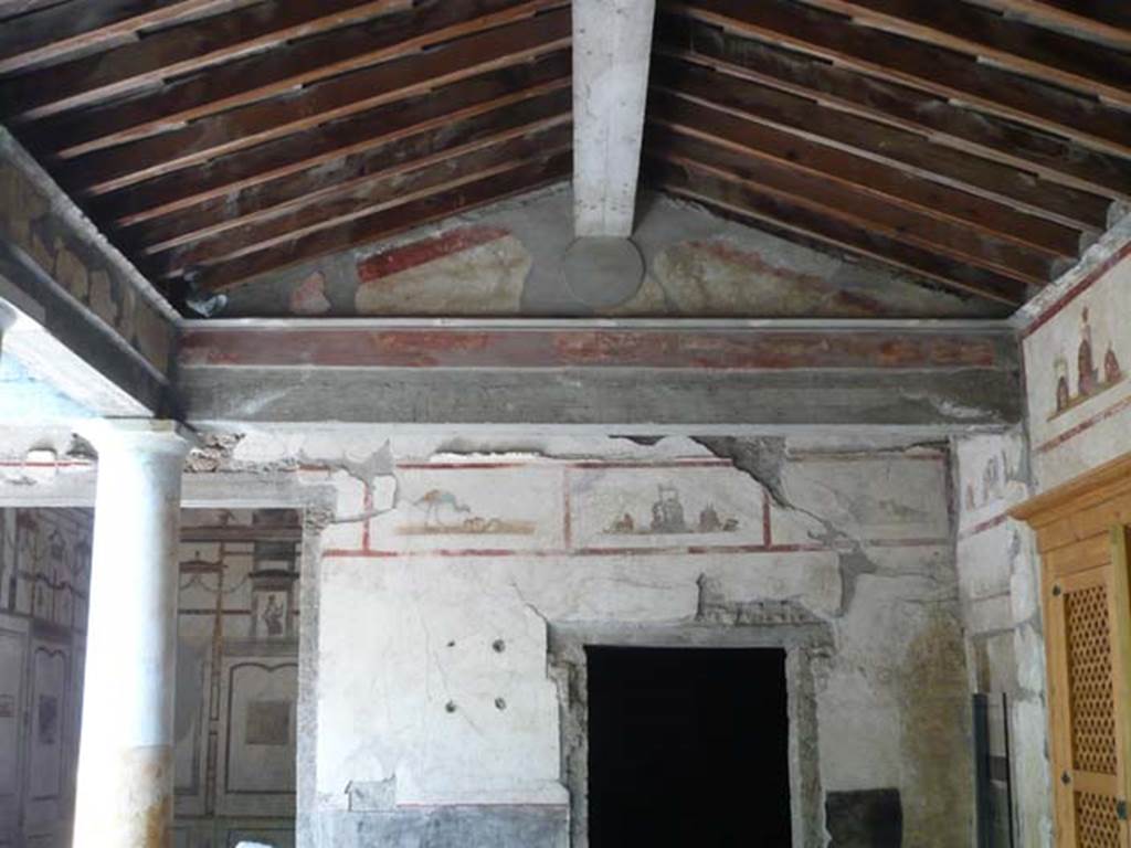 IX.13.1-3 Pompeii. May 2012.
Room 9, looking towards north wall of portico. Room 10 doorway is right of centre. Photo courtesy of Buzz Ferebee.