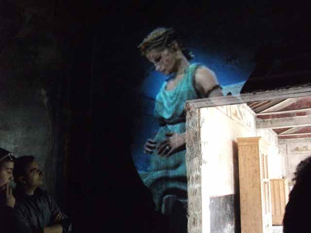 IX.13.1-3 Pompeii. May 2010. Room 10, hologram of the daughter of Julius Polybius.