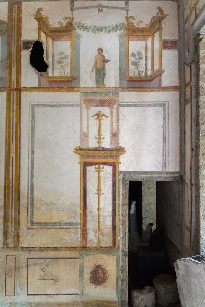 IX.13.1-3 Pompeii. October 2021. 
Room 11, detail of east wall in south-east corner, with doorway to room 10.
Photo courtesy of Johannes Eber.
