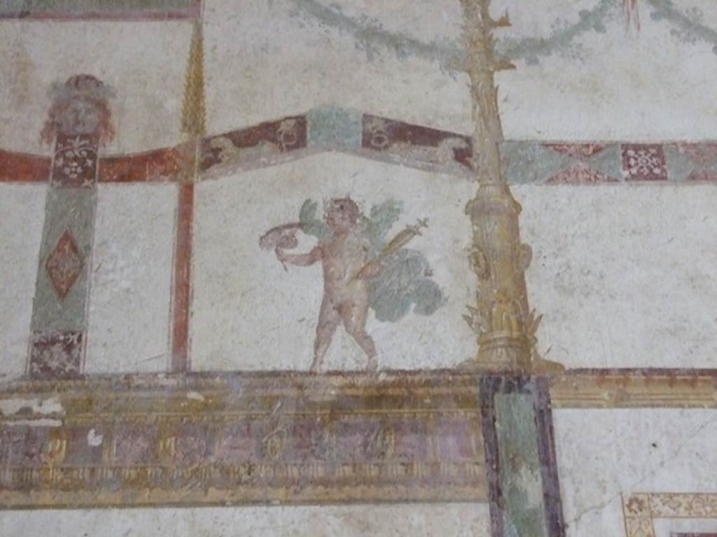 IX.13.1-3 Pompeii. March 2009. Room 11, detail of figure from south end of east wall. 