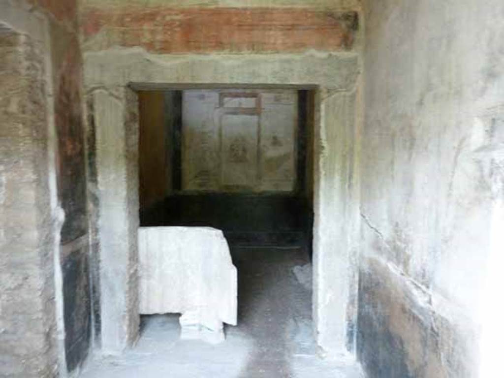 IX.13.1-3 Pompeii. May 2010. Room 12, from antechamber. Looking north.
