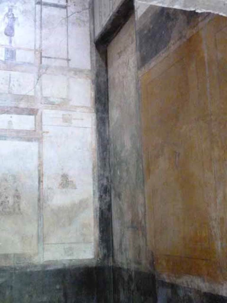 IX.13.1-3 Pompeii. May 2010. Room 12, north east corner. According to Wilhelmina, a similar painting to that on the north-west side was also seen on the north-east side, but was not in a good state.