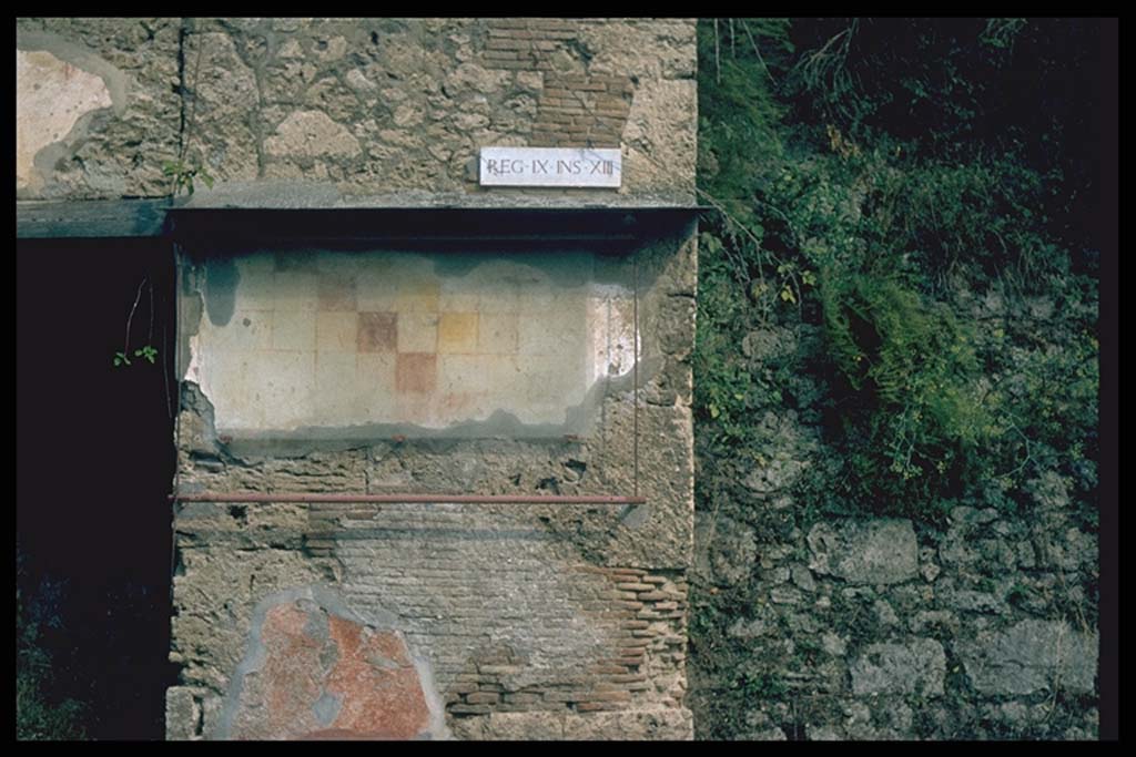 IX.13.6 Pompeii. Plaster with chessboard pattern to east of entrance.
Photographed 1970-79 by Günther Einhorn, picture courtesy of his son Ralf Einhorn.
