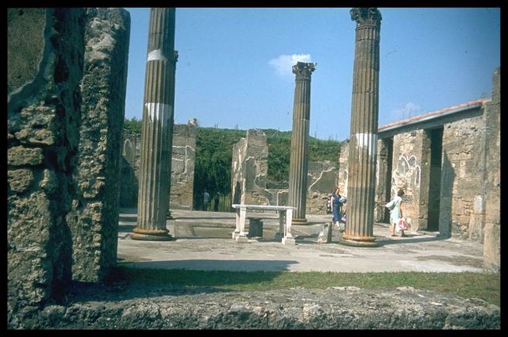 IX.14.4 Pompeii. Looking north across atrium B towards entrance doorway and fauces A. Photographed 1970-79 by Günther Einhorn, picture courtesy of his son Ralf Einhorn.