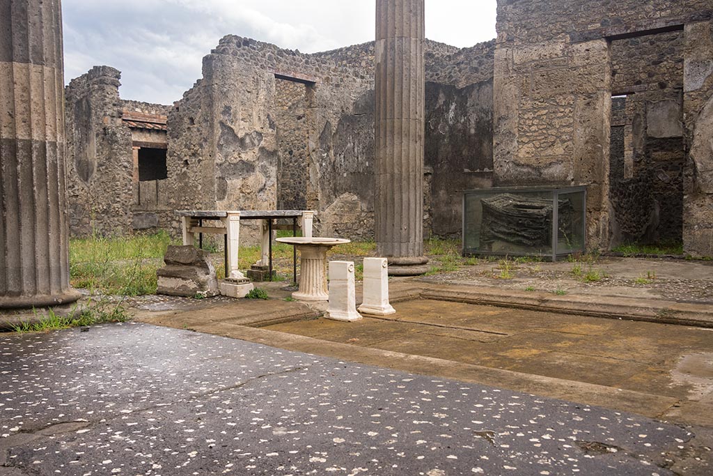 IX.14.4 Pompeii. July 2024. Looking west across atrium, from near doorway of cubiculum E. Photo courtesy of Johannes Eber.