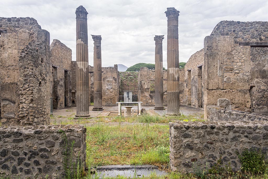 IX.14.4 Pompeii. July 2024.
Looking north from portico, across tablinum towards entrance doorway and atrium. Photo courtesy of Johannes Eber.