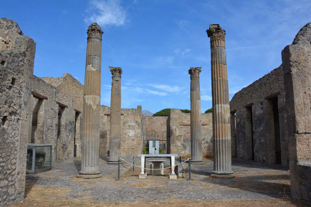 IX.14.4 Pompeii. December 2007. Peristyle 1, looking across north portico to rooms 3 (on left), 5, staircase (m), 12, 13, 14 and 15. 
