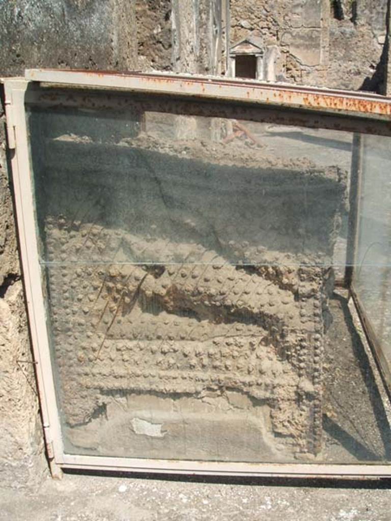 IX.14.4 Pompeii. May 2005. Left side of arca or money chest.