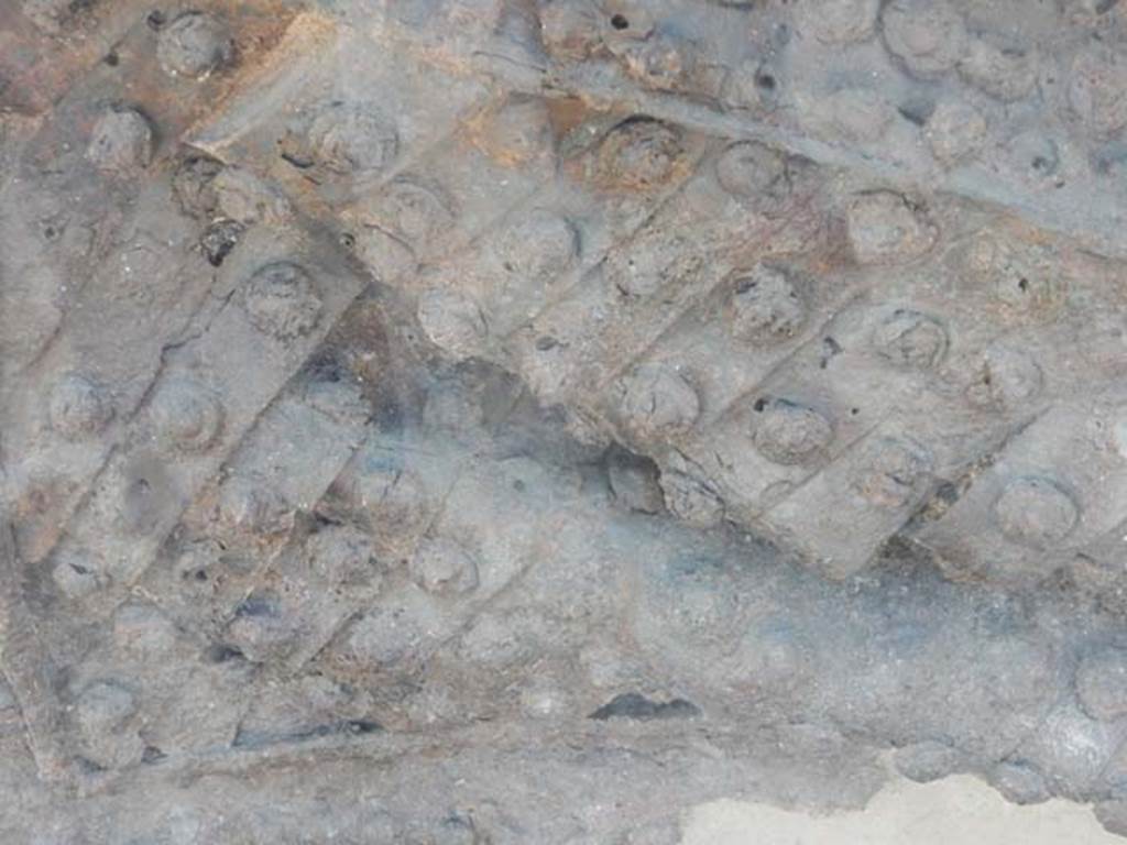 IX.14.4 Pompeii. May 2017. Detail from arca or money chest. Photo courtesy of Buzz Ferebee.