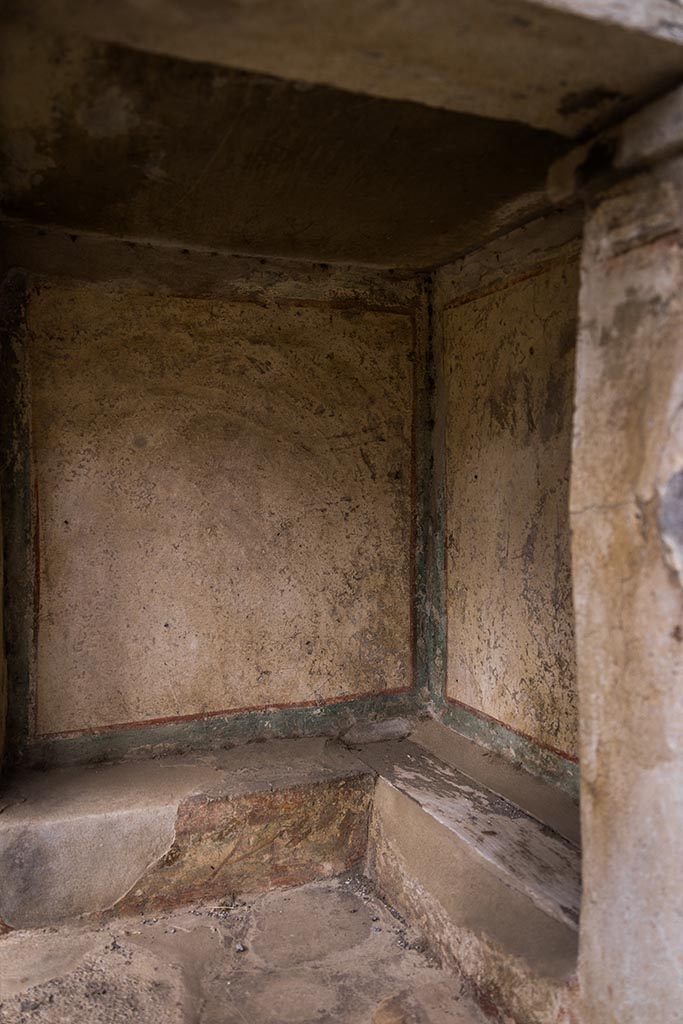 IX.14.4 Pompeii. July 2024.
Looking towards west wall of lararium. Photo courtesy of Johannes Eber.