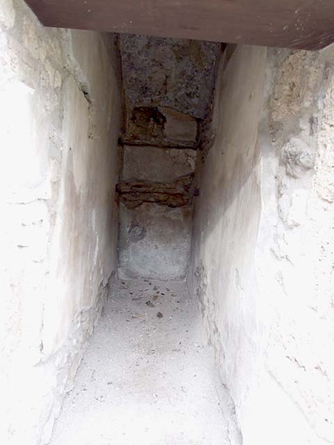 IX.14.4 Pompeii. December 2007. Area on north side of peristyle between rooms 19 and 24. 
This is under the staircase on south-east side of secondary atrium at IX.14.2.
