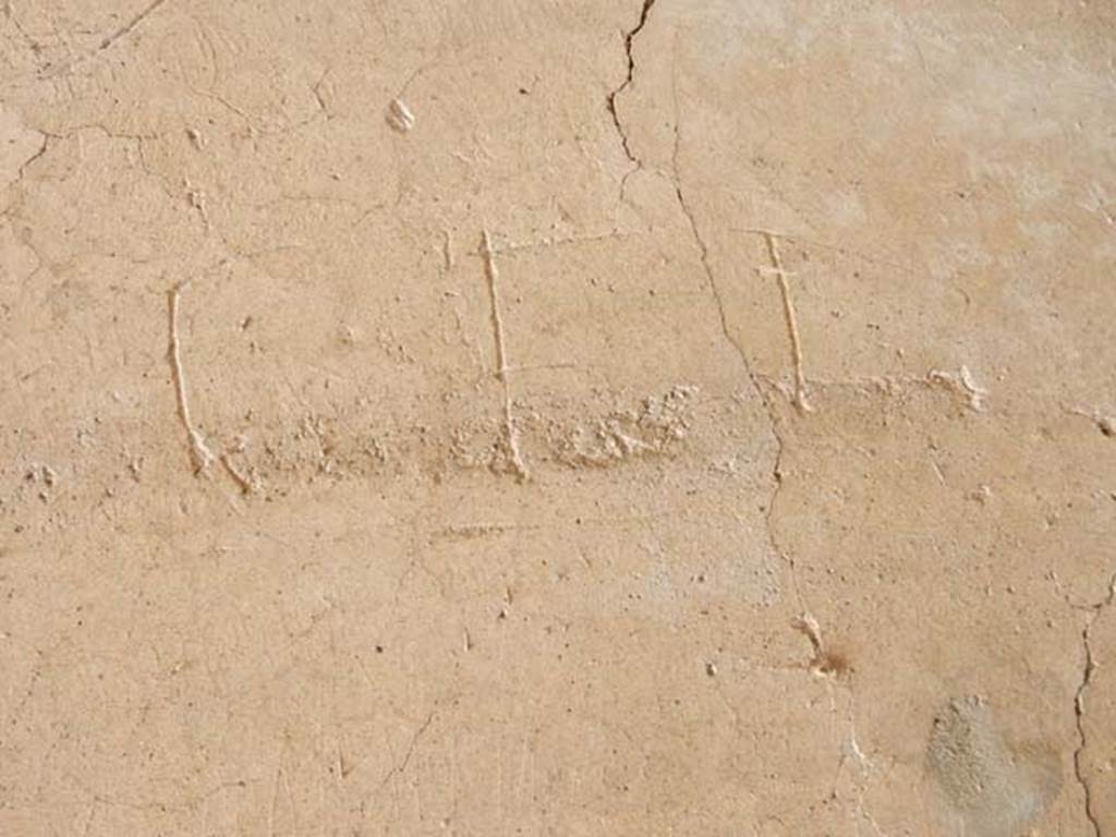 IX.14.4 Pompeii. May 2017. Graffito under the staircase on north side of peristyle.
This reads Cei.
Photo courtesy of Buzz Ferebee.