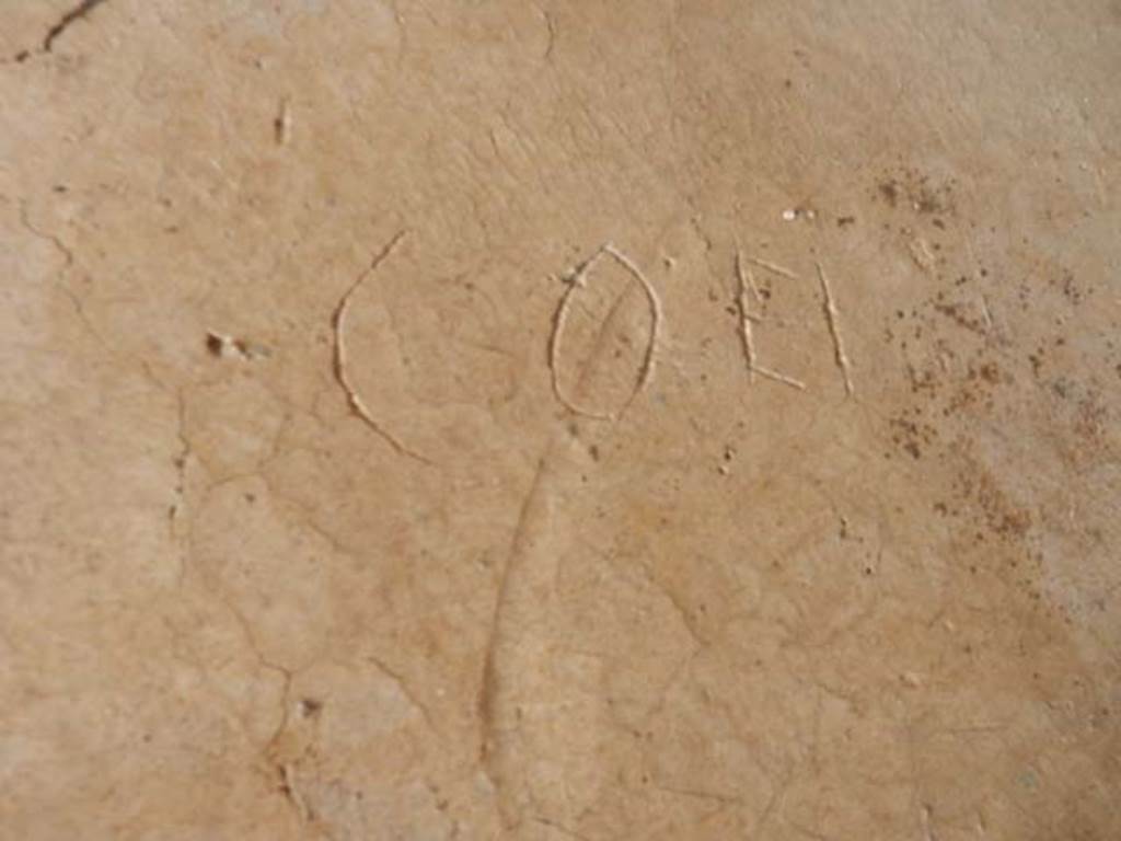 IX.14.4 Pompeii. May 2017. Graffito under the staircase on north side of peristyle.
This reads Coei.
Photo courtesy of Buzz Ferebee.
