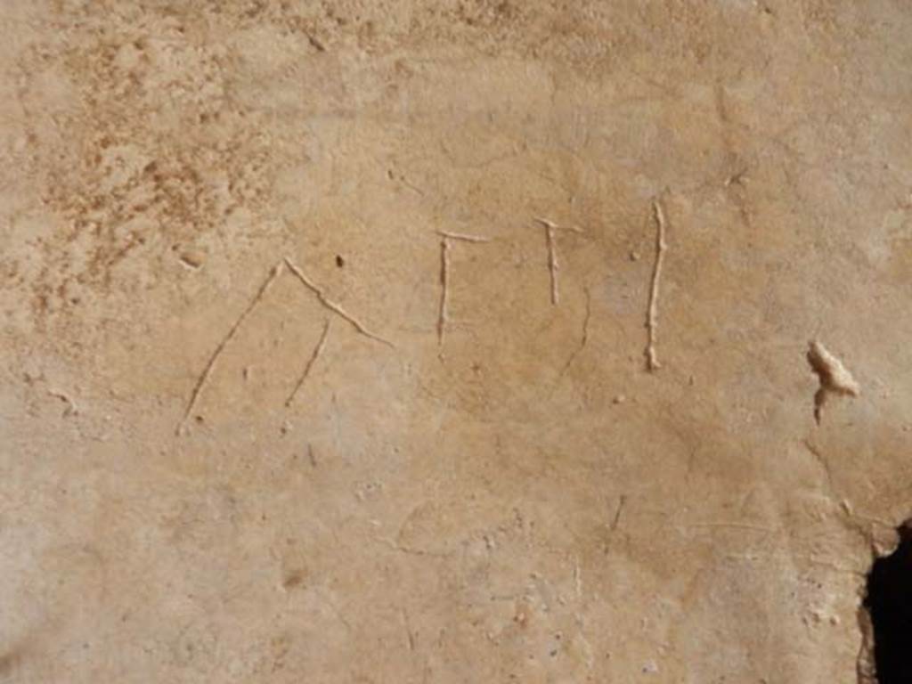 IX.14.4 Pompeii. May 2017. Graffito under the staircase on north side of peristyle.
This reads Atti.
Photo courtesy of Buzz Ferebee.
