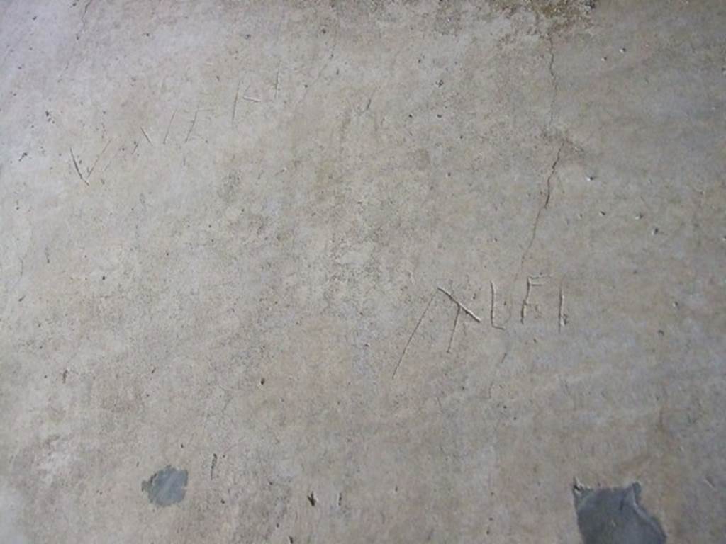 IX.14.4 Pompeii. December 2007. Area under the staircase on north side of peristyle. Graffito, ancient or modern?
