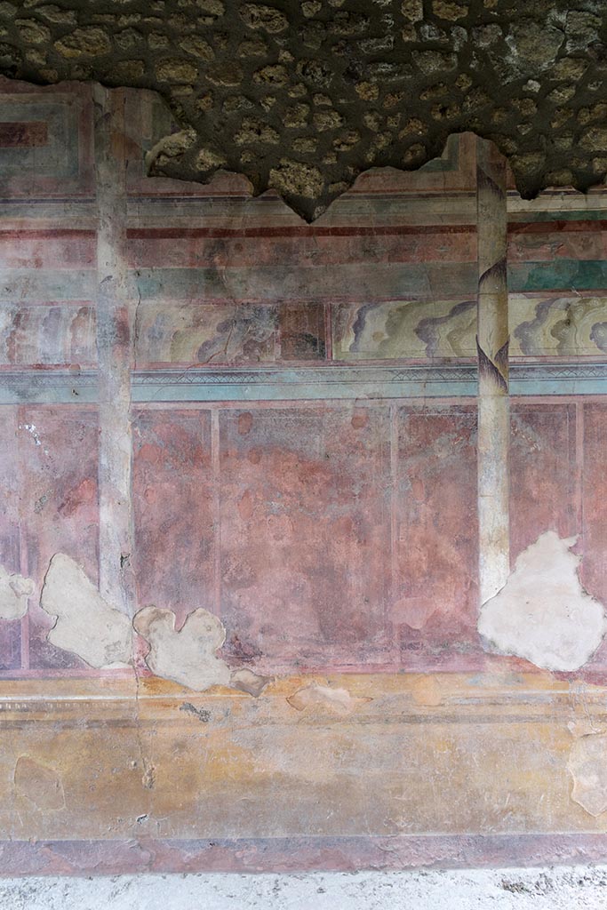 IX.14.4 Pompeii. July 2024. Tablinum, detail from centre of east wall. Photo courtesy of Johannes Eber.