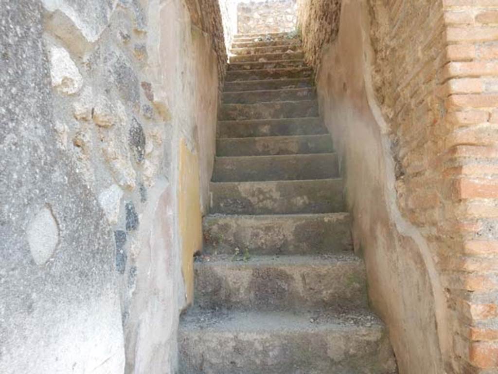 IX.14.4 Pompeii. May 2017. Staircase to upper floor in south-east corner of secondary atrium 27 at IX.14.2. Photo courtesy of Buzz Ferebee.