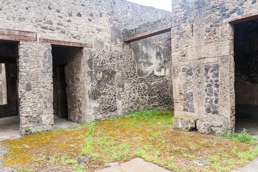 IX.14.4 Pompeii. July 2024. Room 27, secondary atrium, looking south-west towards ala. Photo courtesy of Johannes Eber.