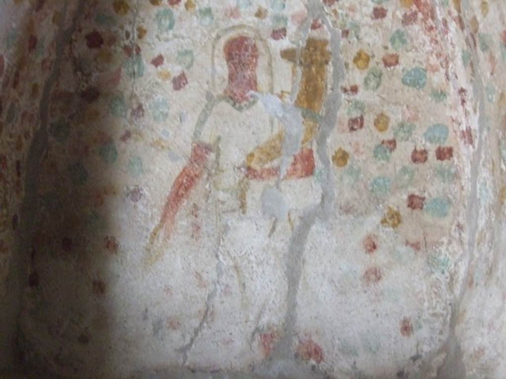 IX.14.4 Pompeii. December 2007. Niche on south wall of kitchen 18. Detail of painting of figure of Genius holding a cornucopia.