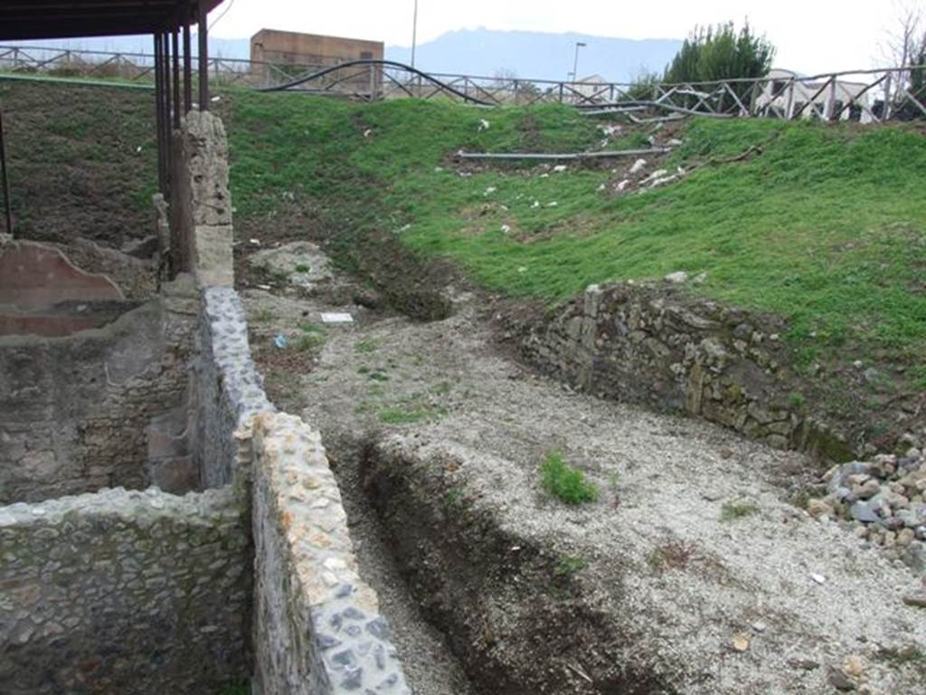 IX.14.4 Pompeii.    December 2007.  Looking south west into unexcavated vicolo from rear upper level.