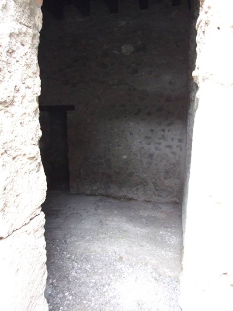 IX.14.4 Pompeii. December 2007. Doorway to room 11, looking north to access under staircase (m).