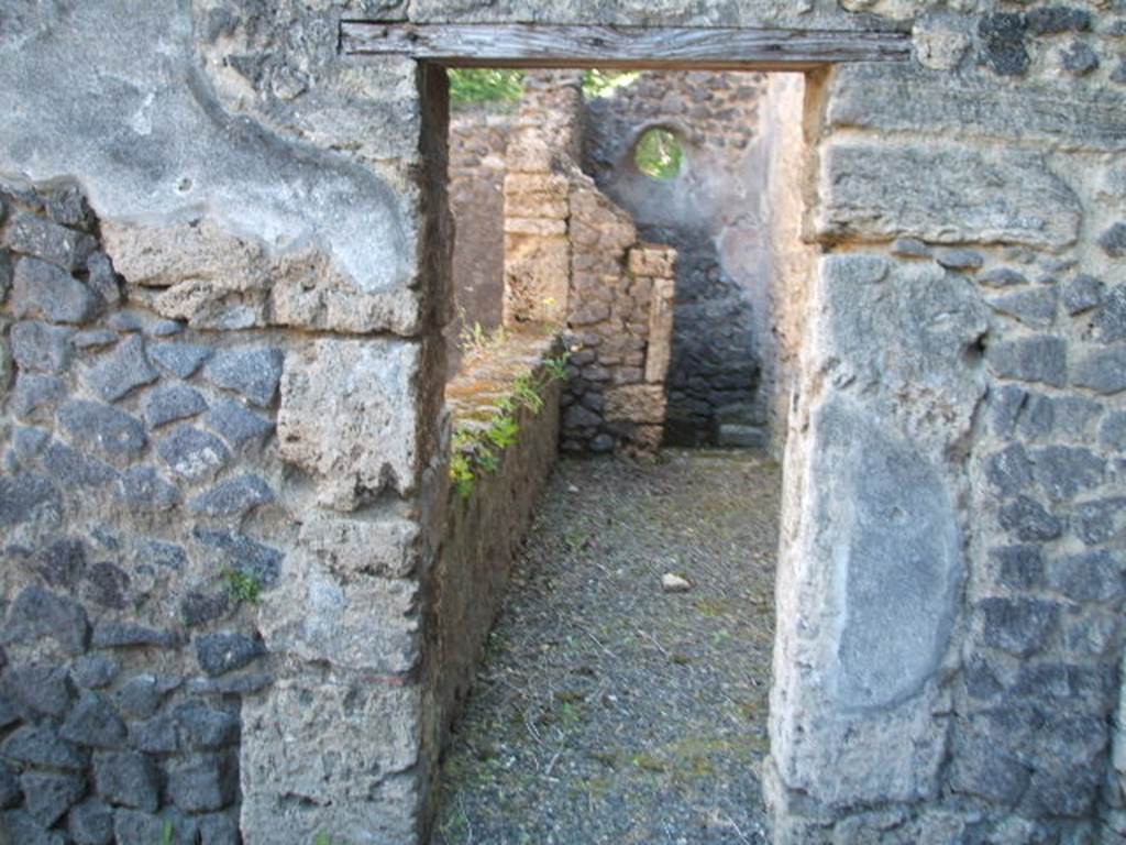 IX.14.4 Pompeii. May 2005. Doorway to room 8 in south-east corner. 
