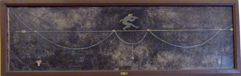 HGW06 Pompeii. Found in triclinium on 1st June 1748. Wall painting of Satyr playing pipes.
Now in Naples Archaeological Museum. Inventory number 9163.