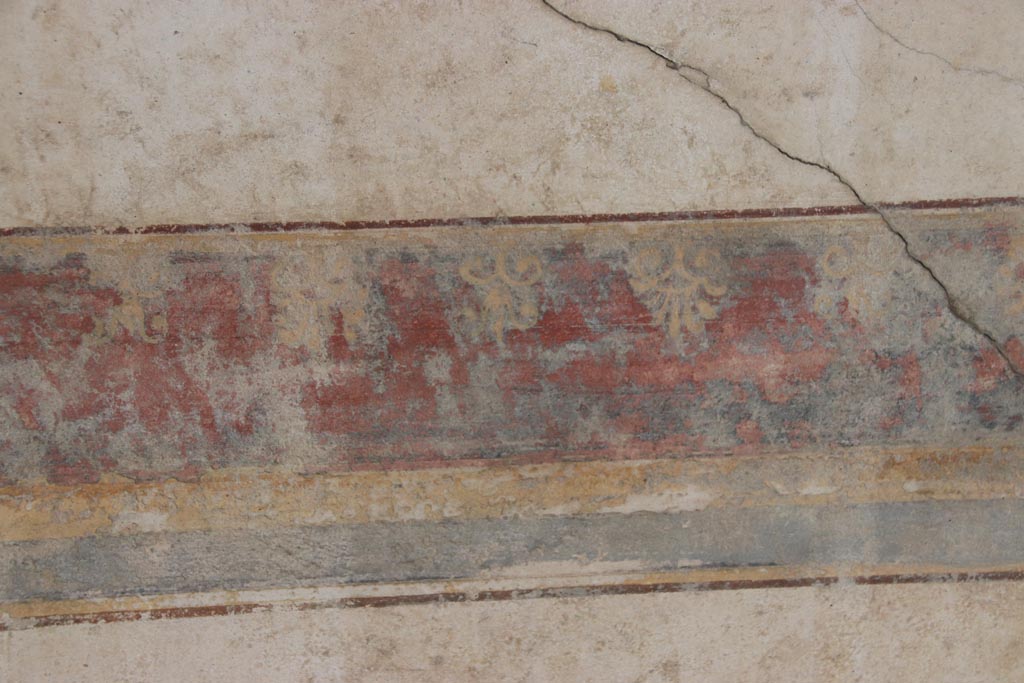 Villa San Marco, Stabiae, October 2022.
Portico 2, detail of painted decoration from lower border on painted panel on east wall. Photo courtesy of Klaus Heese.