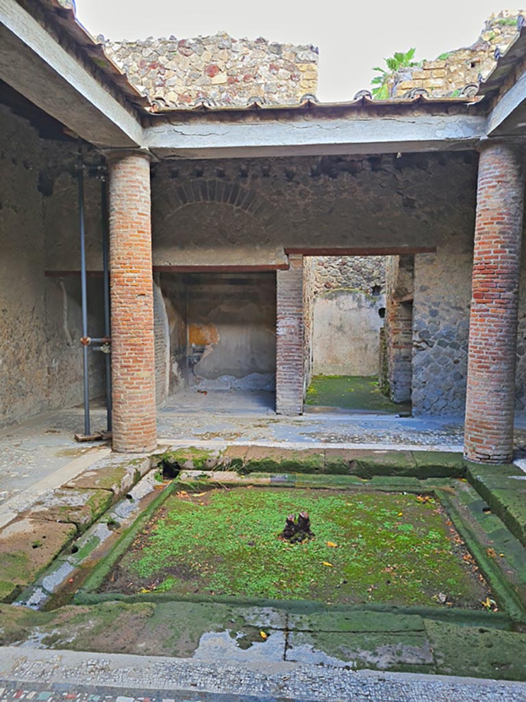 Villa of Mysteries, Pompeii. November 2023. 
Room 62, looking east across impluvium in tetrastyle atrium. Photo courtesy of Giuseppe Ciaramella.
