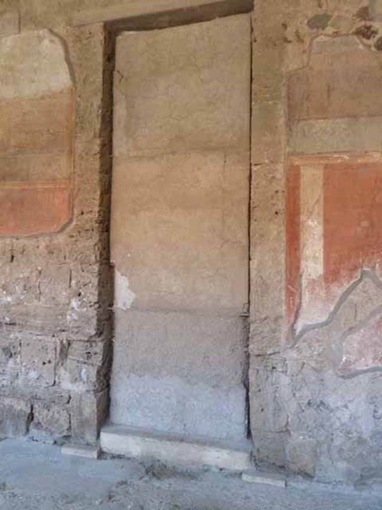 Villa of Mysteries, Pompeii. May 2010. Blocked door to atrium, in west wall of peristyle A.