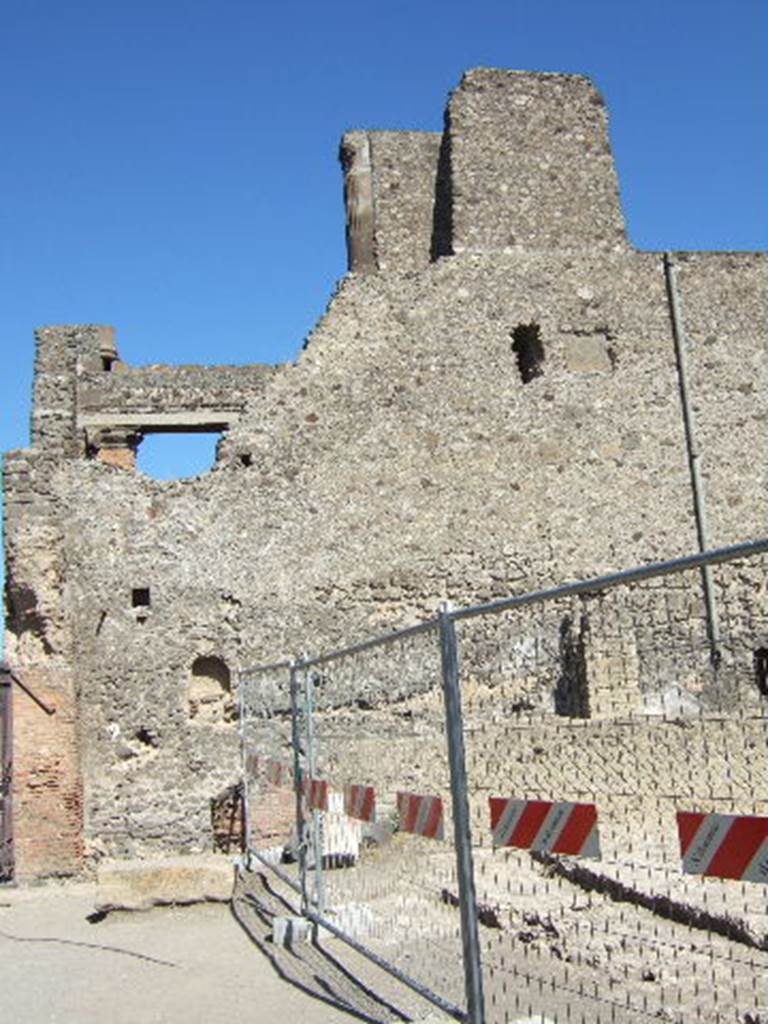 VIII.1.3 Pompeii. September 2005. Looking east towards rear wall of Basilica from Temple of Venus.
