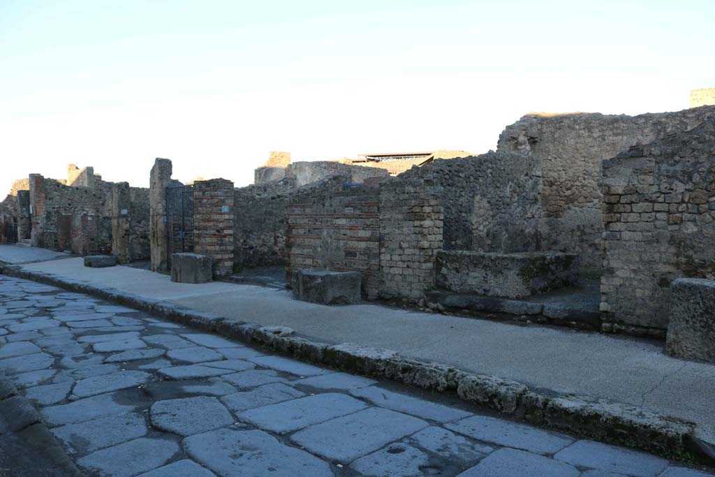 Via Marina, north side, Pompeii. December 2018. 
Looking north-west towards VII.7.10, on left, and VII.7.3, on right. Photo courtesy of Aude Durand.

