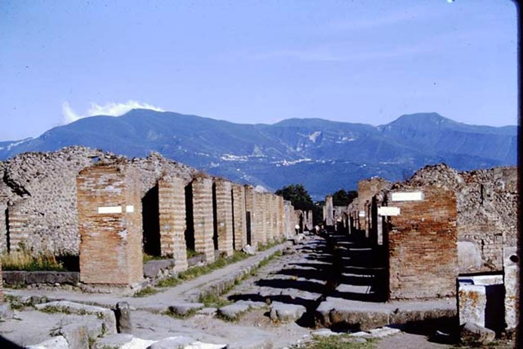 Via Stabiana, Pompeii. 1966. Looking south from the crossroads, with Via di Nola (on left) and Via della Fortuna (on right).  Photo by Stanley A. Jashemski.
Source: The Wilhelmina and Stanley A. Jashemski archive in the University of Maryland Library, Special Collections (See collection page) and made available under the Creative Commons Attribution-Non Commercial License v.4. See Licence and use details.
J66f0333
