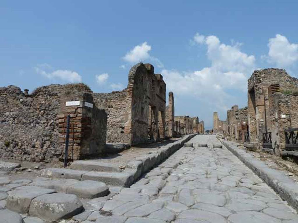 Via Stabiana, west side, May 2010. Looking north-west along VIII.4, from junction with Via del Tempio d’Iside, on left, and VIII.4.28.