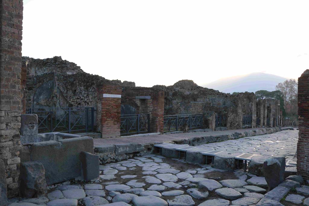 Via Stabiana, east side, Pompeii. December 2018. Looking south-east towards Insula 4 of Region I, (I.4.15 at rear of fountain).
Photo courtesy of Aude Durand.