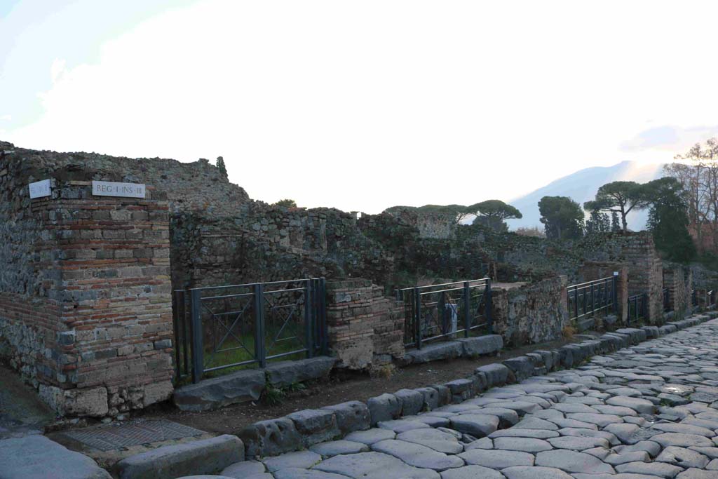 Via Stabiana, December 2018. Looking south along east side of Via Stabiana, from I.3.12 to I.3.8. Photo courtesy of Aude Durand.