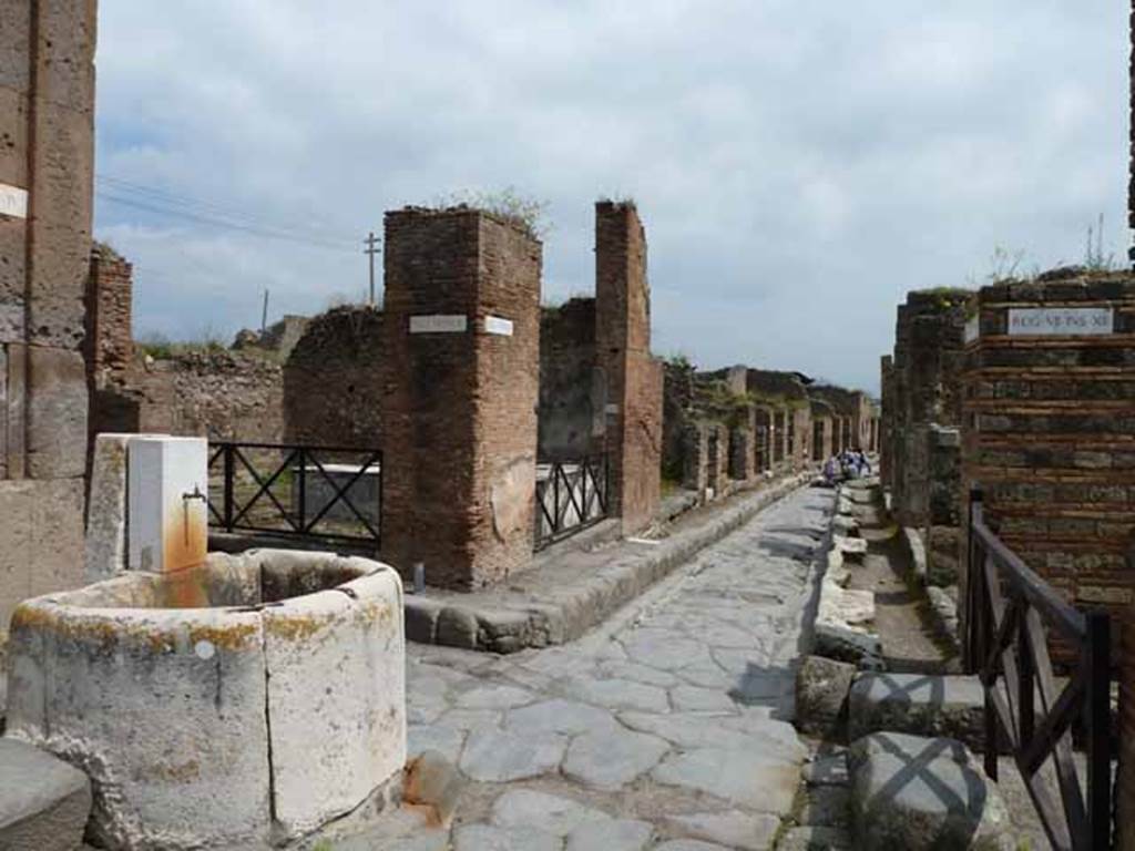 Via degli Augustali, between VII.2 and VII.12, May 2010. Looking east to junction with Vicolo Storto (on left) and Vicolo Eumachia (right).