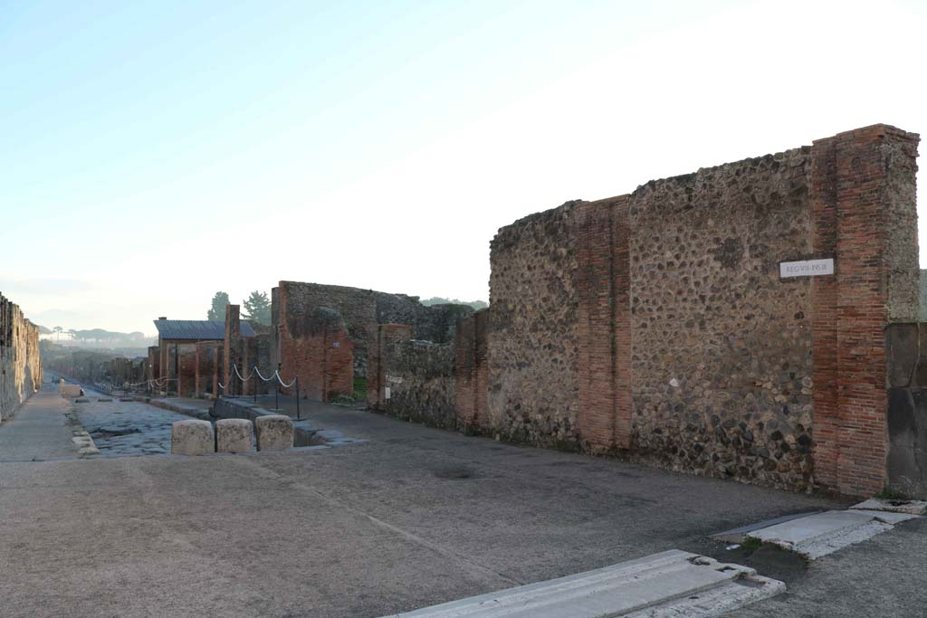 Via dell’Abbondanza, south side, Pompeii. December 2018.
Looking south-east, from east side of Forum, towards north side of Insula VIII.3. Photo courtesy of Aude Durand.
