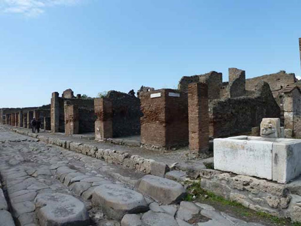 Via della Fortuna, north side. May 2010. Looking west from VI.14.16. at junction with crossroads
