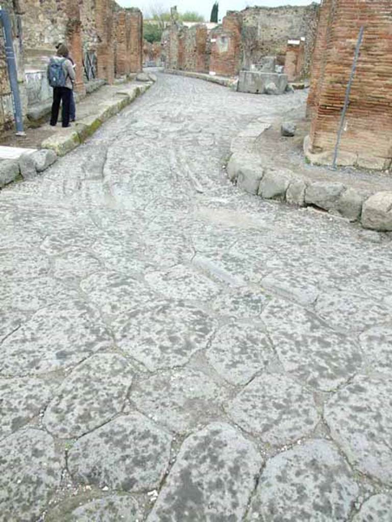 Via delle Terme. May 2010. Looking north at wheel ruts at junction with Via Consolare.