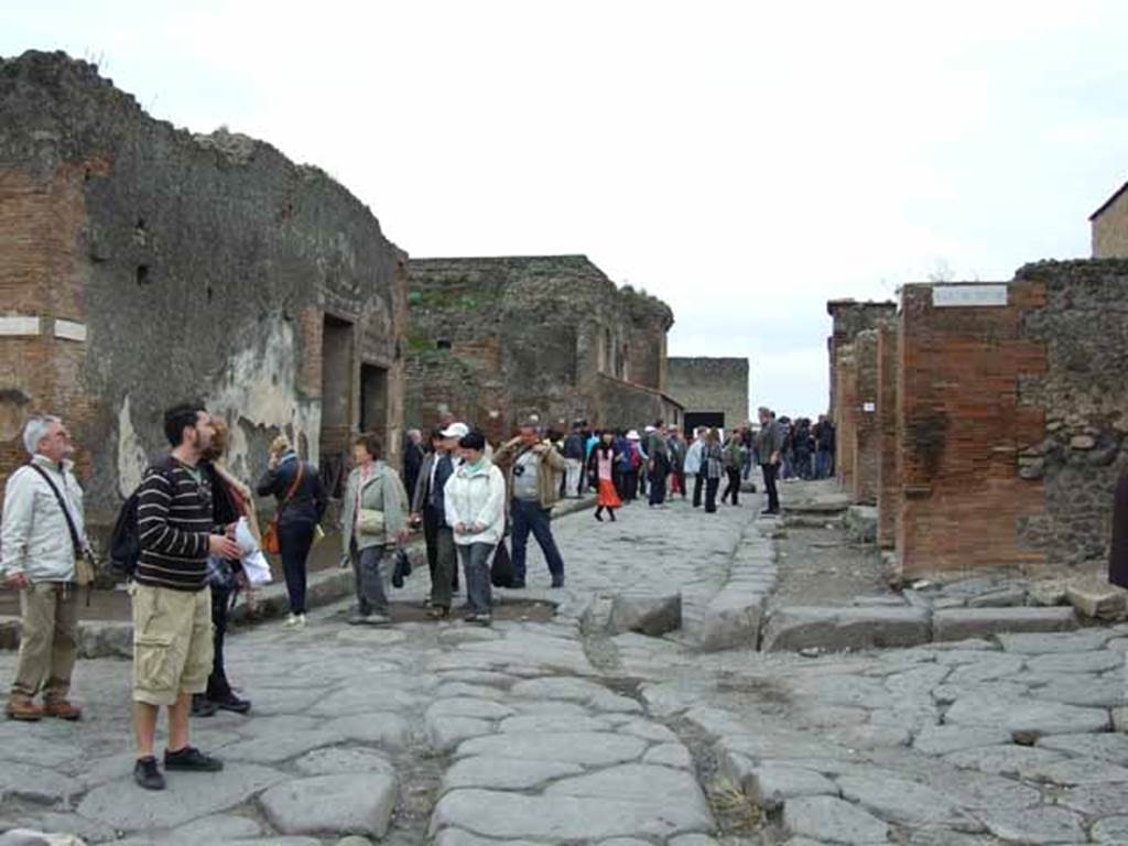 Via delle Terme. May 2010. Looking west between VII.5 and VI.8, from the junction with Via del Foro and Via Mercurio. Note the heavy wheel track wear on the road.