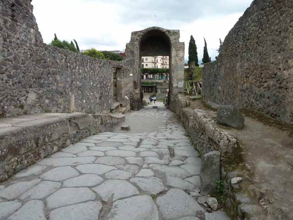 Via di Nocera, May 2010. Looking south between II.8 and I.20, towards the Porta Nocera.