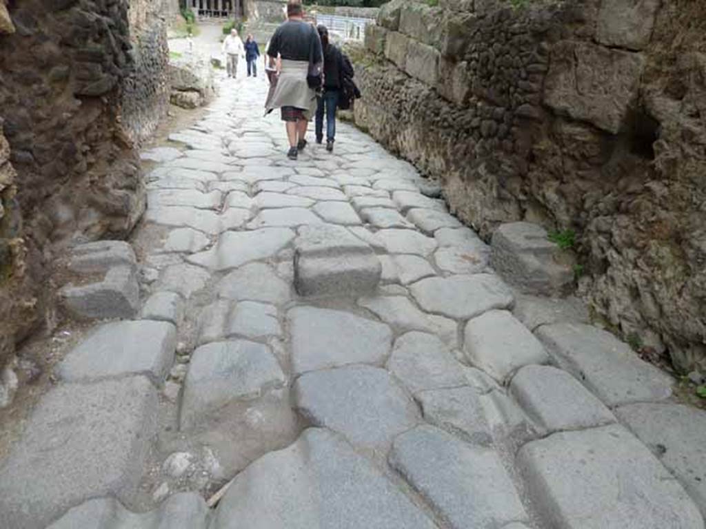 Via di Nocera, May 2010. Roadway under the Porta Nocera, looking south.