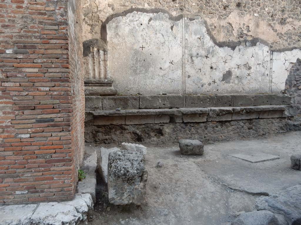 Vicolo dei Soprastanti, Pompeii. June 2019. Looking south from arch, (on left) towards north wall of Forum.
Photo courtesy of Buzz Ferebee.