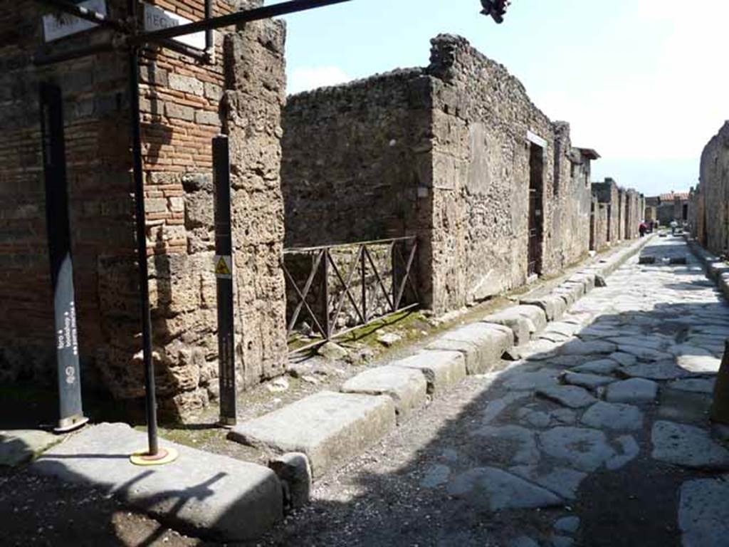 Vicolo dei Vettii, east side.  May 2010. Looking south along VI. 14.