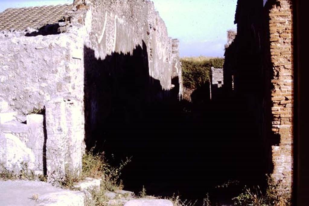 Vicolo del Centenario, Pompeii. 1968. Looking south between IX.8 and IX.5 towards the unexcavated. Photo by Stanley A. Jashemski.
Source: The Wilhelmina and Stanley A. Jashemski archive in the University of Maryland Library, Special Collections (See collection page) and made available under the Creative Commons Attribution-Non Commercial License v.4. See Licence and use details.
J68f0674
